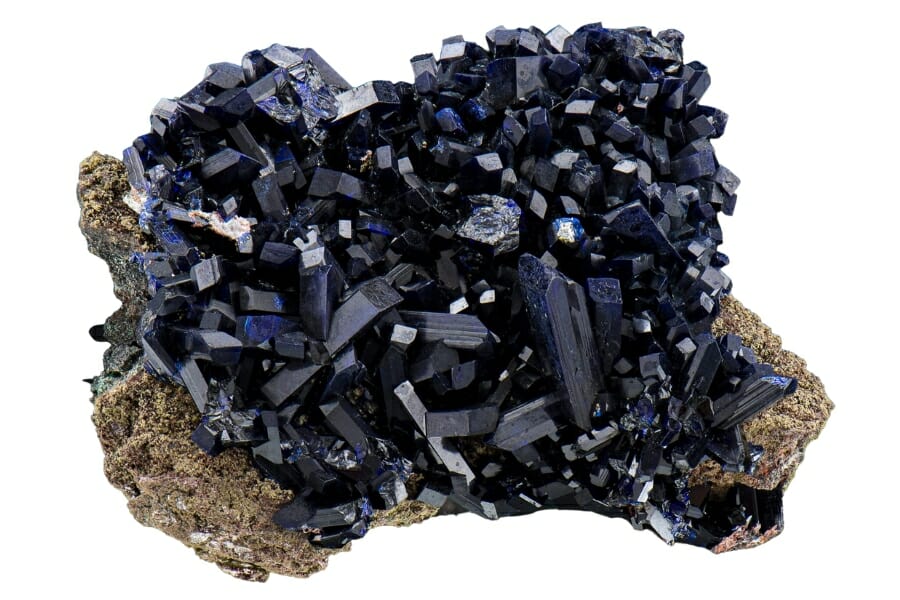 Dark blue Azurite clusters on a rock