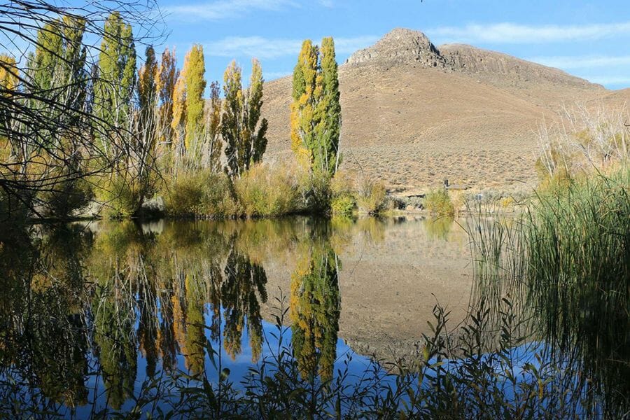 A scenic view of the Battle Mountain which mirrors on the pretty lake