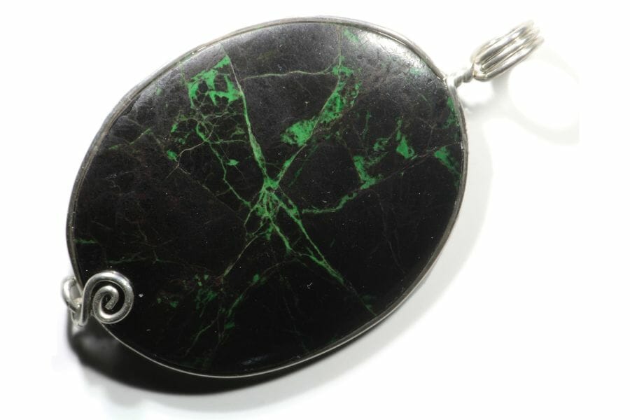 A gorgeous black chromite pendant with streaks of green