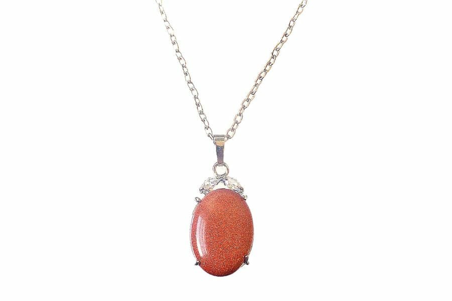 A gorgeous brown sandstone opal necklace with a silver chain