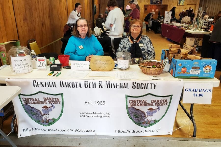 Two ladies at the front of house of the Central Dakota Gem and Mineral Society rock show