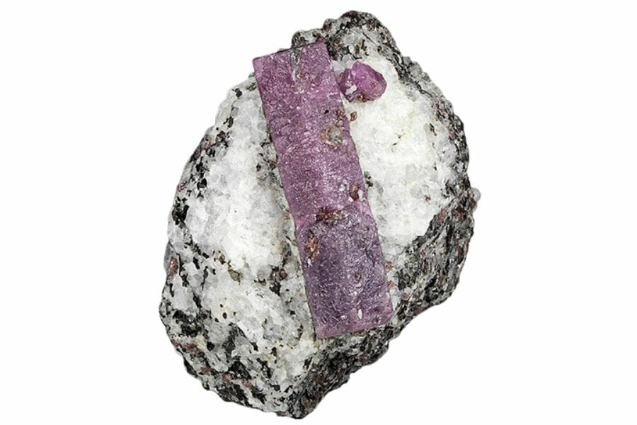 A rare beautiful corundum mineral with a purple strip of crystals on the middle