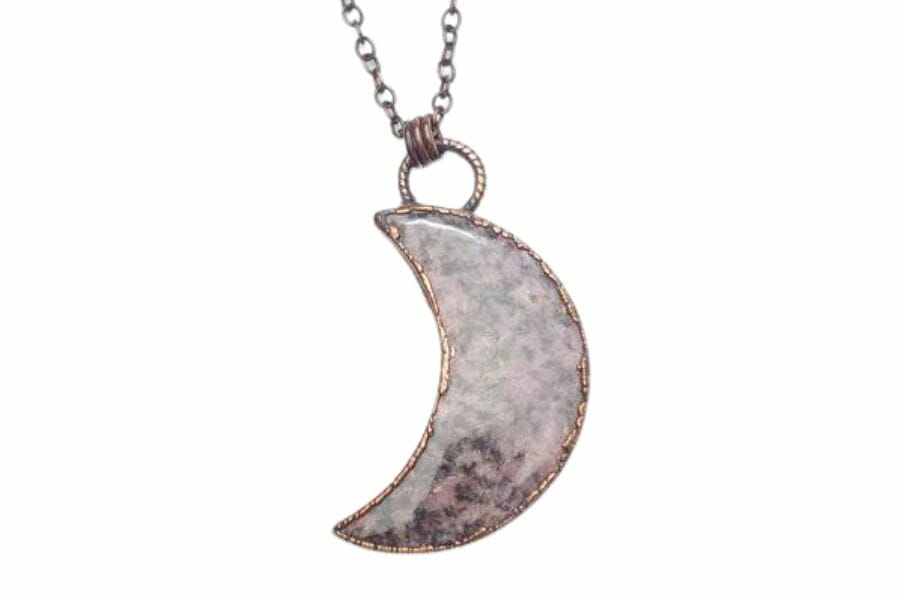 A unique crescent moon rhodonite pendant 