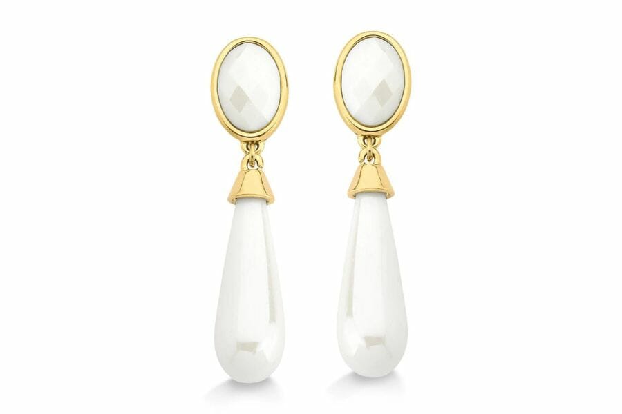 A pair of exquisite white dolomite earrings with gold accents