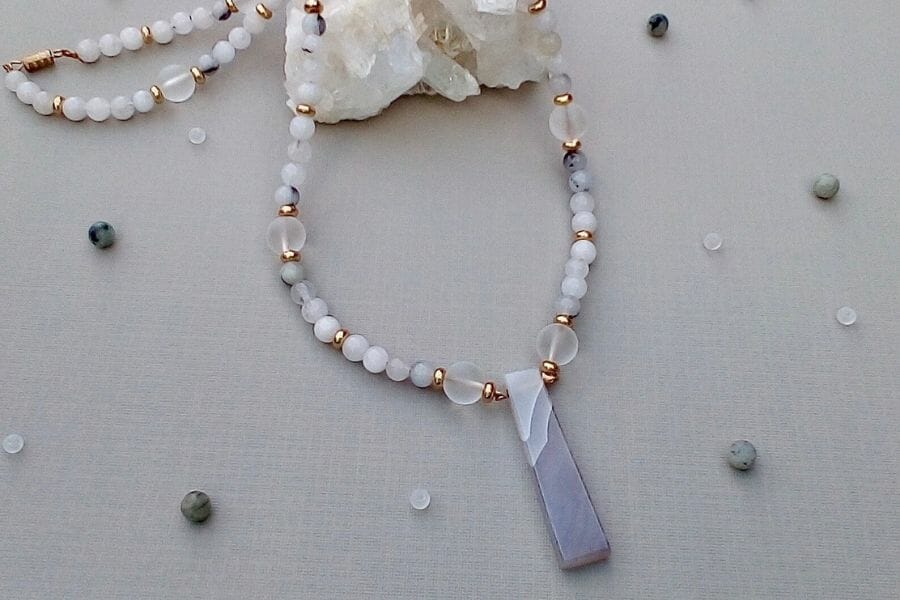 A pretty dolomite pendant with white beads necklace