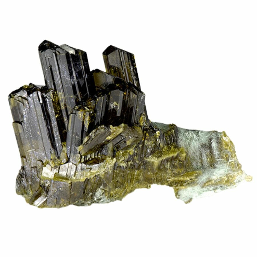 A stunning epidote crystal towers with different green hues