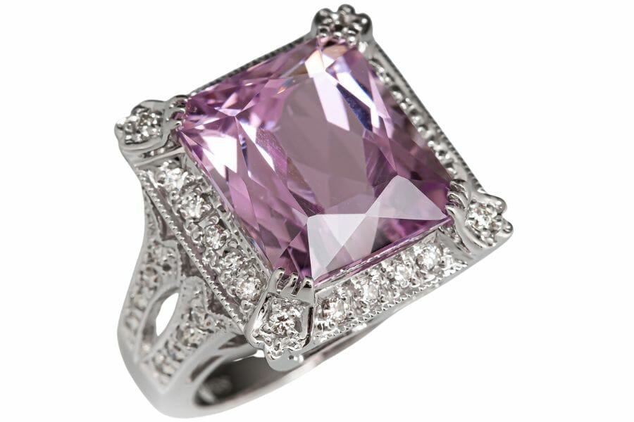 A diamond-cut kunzite cocktail ring surrounded with small diamond crystals