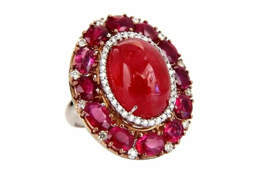 A luxurious rhodonite ruby diamond cocktail ring