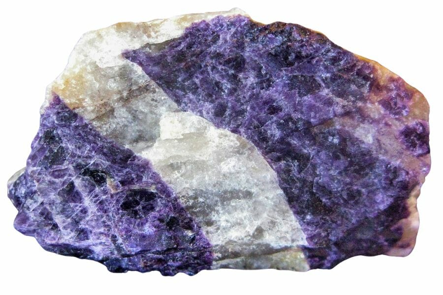A dazzling purple fluorite with a white streak in the middle