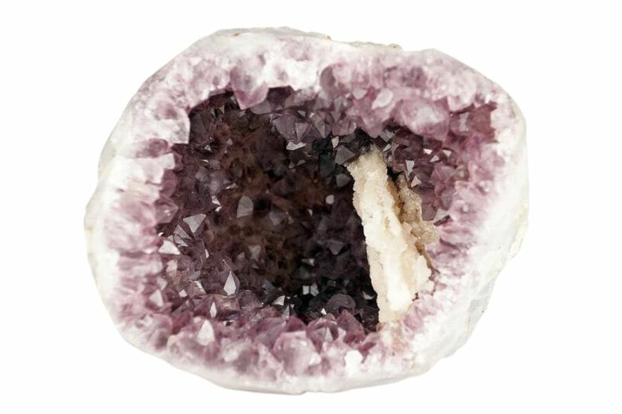 A stunning geode with glistening amethyst crystals inside