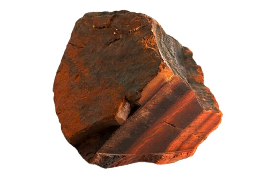 A piece of raw, red Jasper with black lines of details