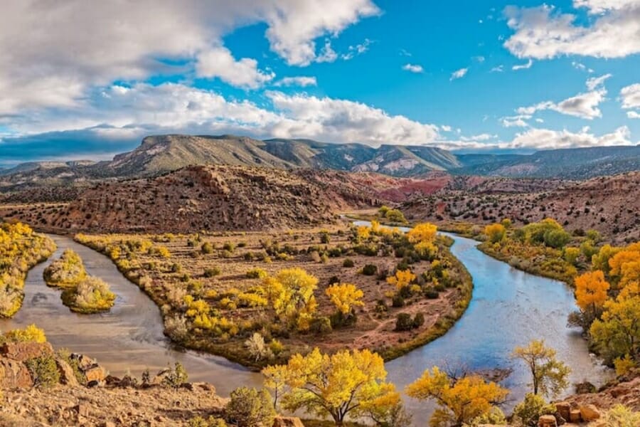 A stunning scenic view over the Jemez Mountain with a river bend at the bottom
