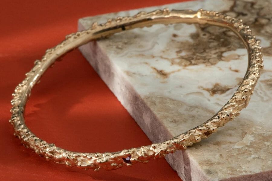 An expensive kimberlite bangle with intrinsic details