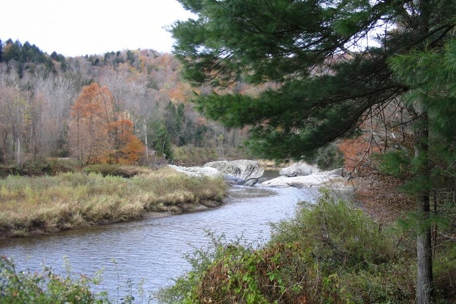 Serene flowing Lamoille River where various rocks and minerals are found