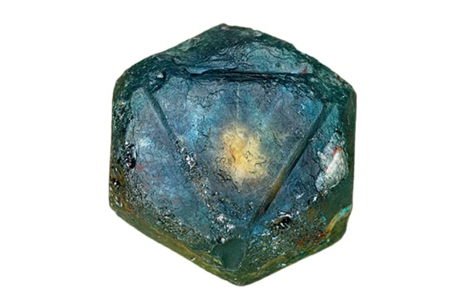 Montana Sapphire displaying blue hue in the middle and a greenish tint on the sides