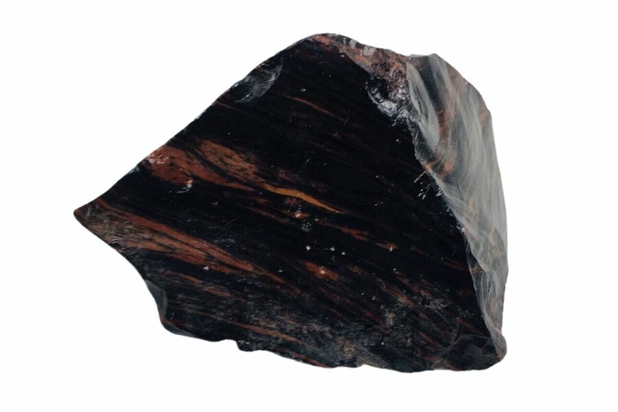 A pretty tiny obsidian stone with unique red streaks