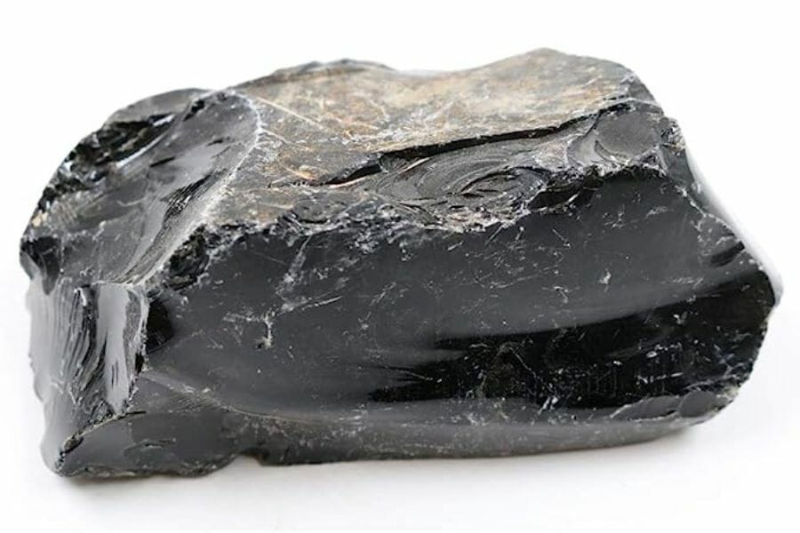 A stunning obsidian crystal with a rough surface