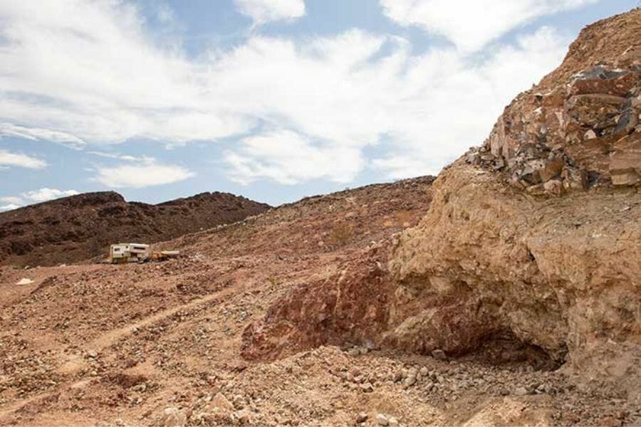 Opal Mountain full of dirt, gravel, and rocks where you can dig for opal specimens