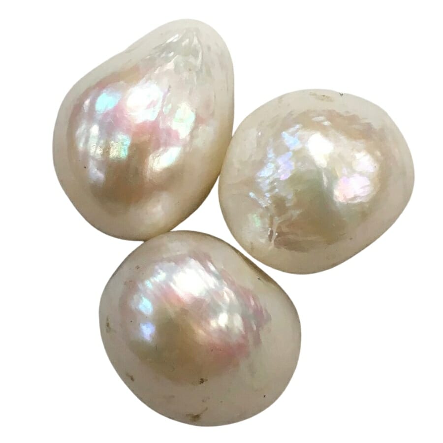 Three pieces of raw white Pearls
