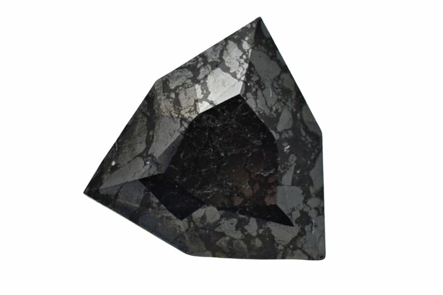 An elegant polished chromite with a unique irregular shape