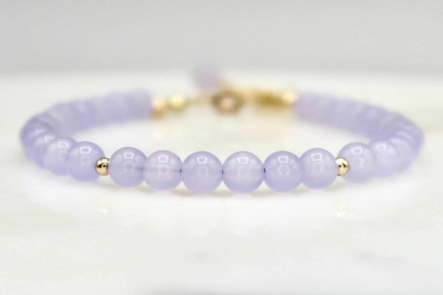 A simple but beautiful purple chalcedony beaded bracelet with small gold beads