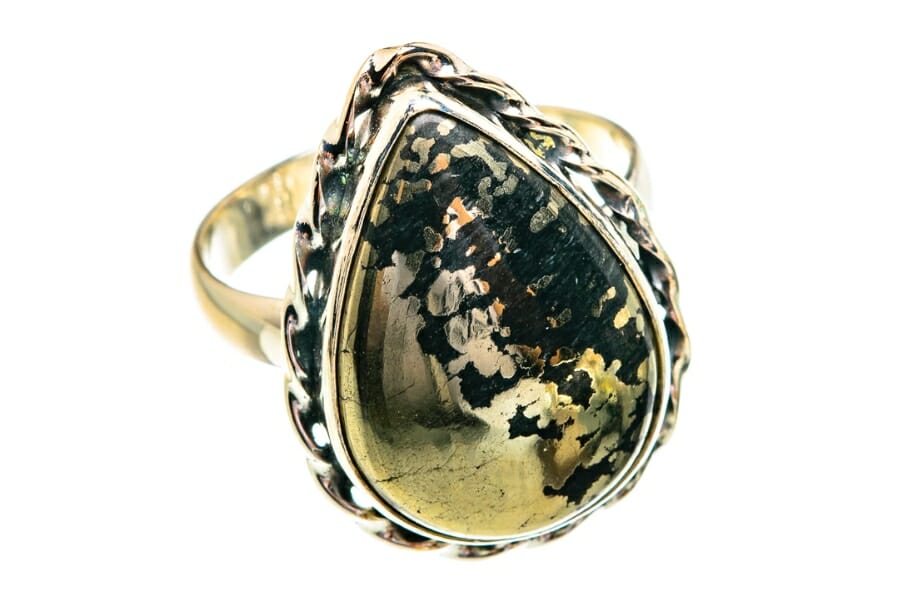 A stunning gold ring with Pyrite (gold) on Magnetite (black) as center stone