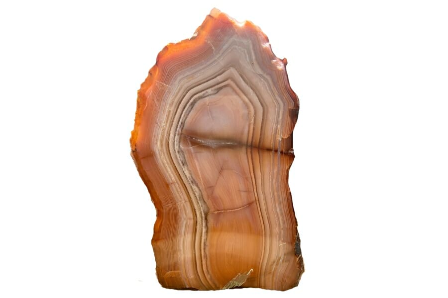 A beautiful tall agate crystal with different red hues