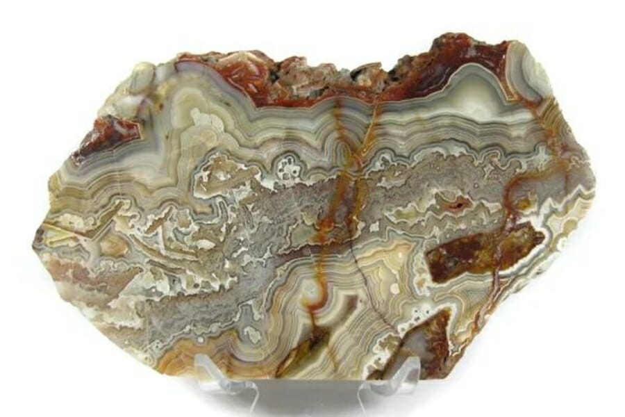 A gorgeous agate with a distinct pattern and orange streaks