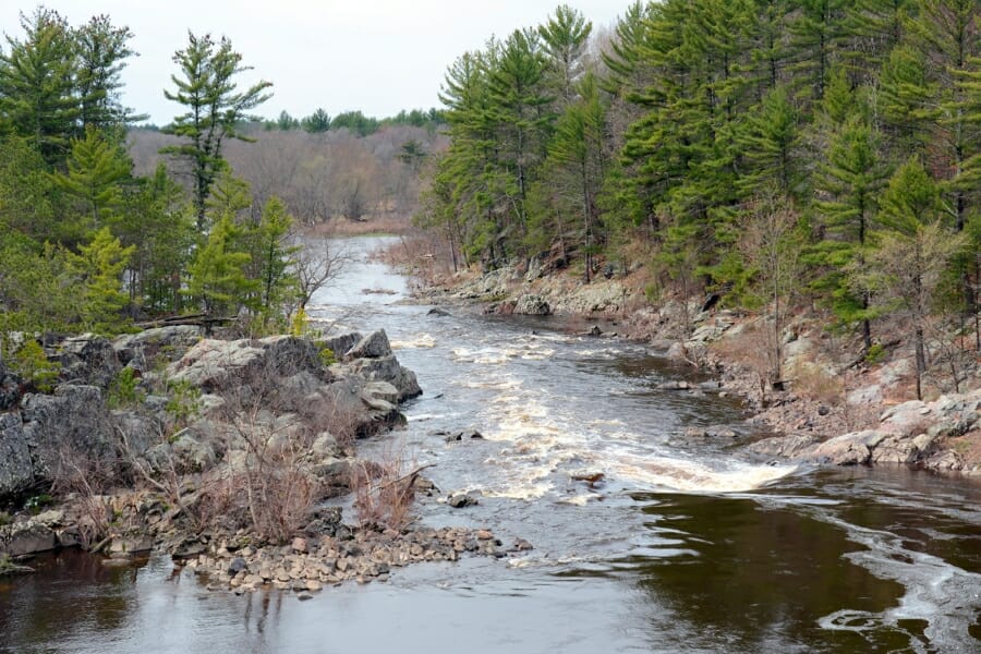 View of the running waters of Black River and its surrounding landscapes