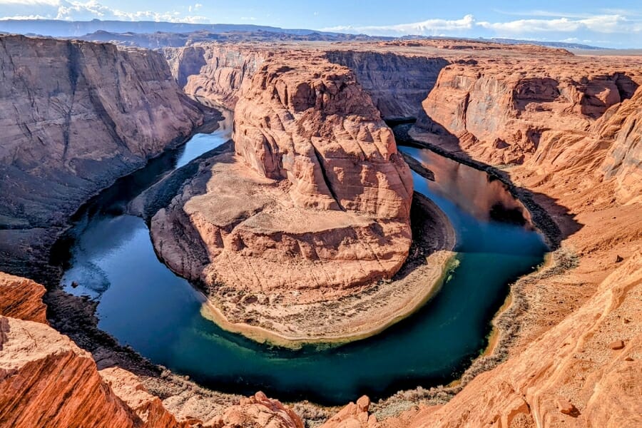The Colorado River flowing through the iconic and historical Horseshoe Bend 