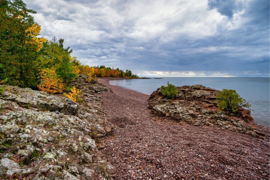 A stretch of the Copper Harbor shoreline full of rocks