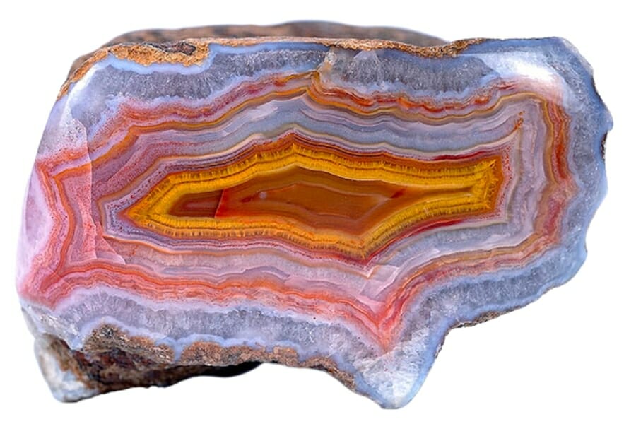 Close-up view of a fortification agate and its vibrant-colored patterns