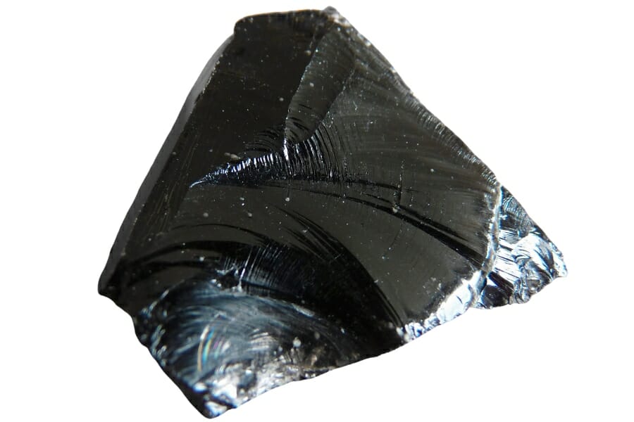 A close up look at a glassy black Obsidian