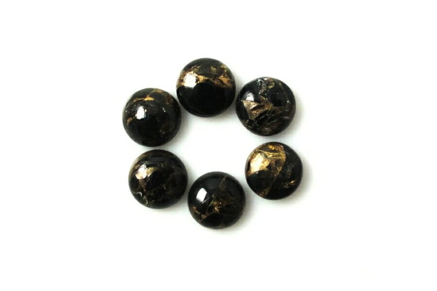 Tiny circular obsidian cabochons with gold streak
