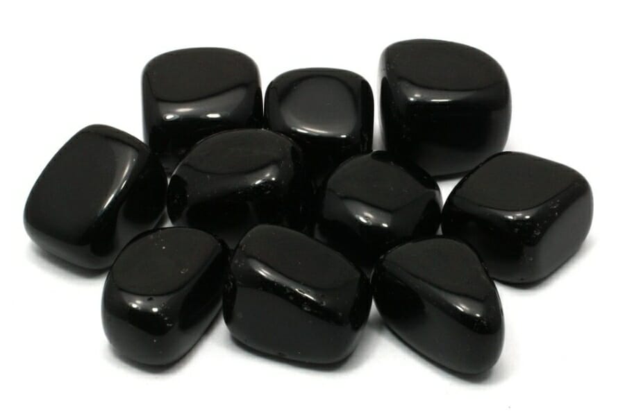 Shiny obsidian tumbled stones