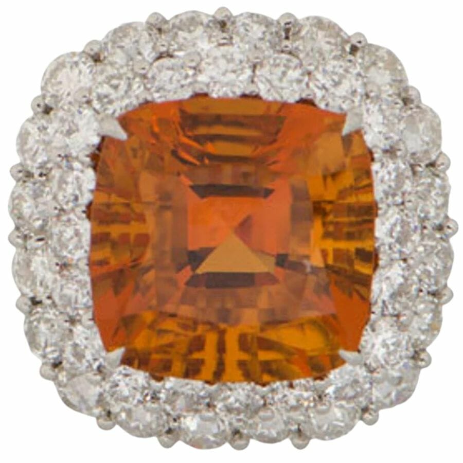 Orange citrine gem set in a ring