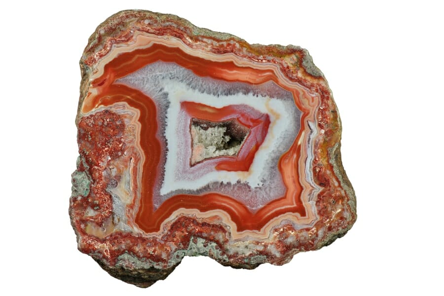 A mesmerizing agate crystal with intricate patterns of reds and whites