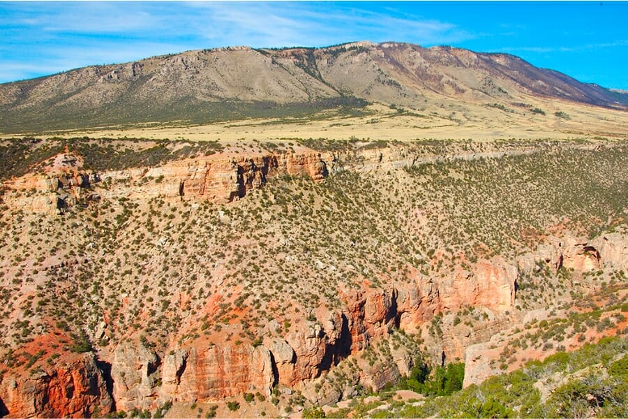 Wide view of the Pryor Mountains foregrounded by stunning rock formations