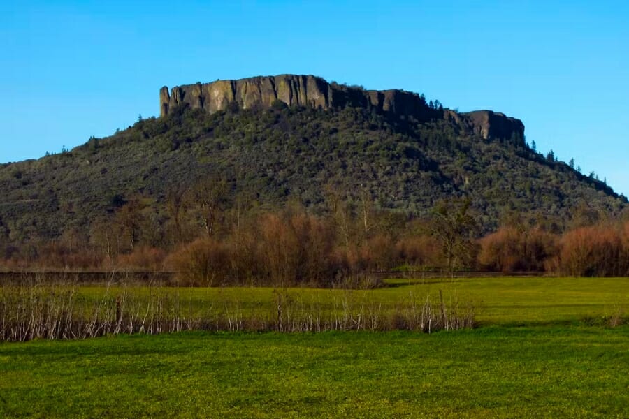 Wide view of the Table Rock formation foregrounded with a wide field