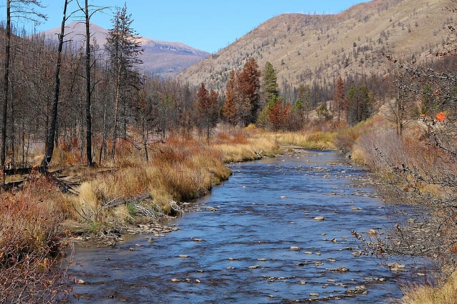 Willow Creek and its surrounding mountains and trees