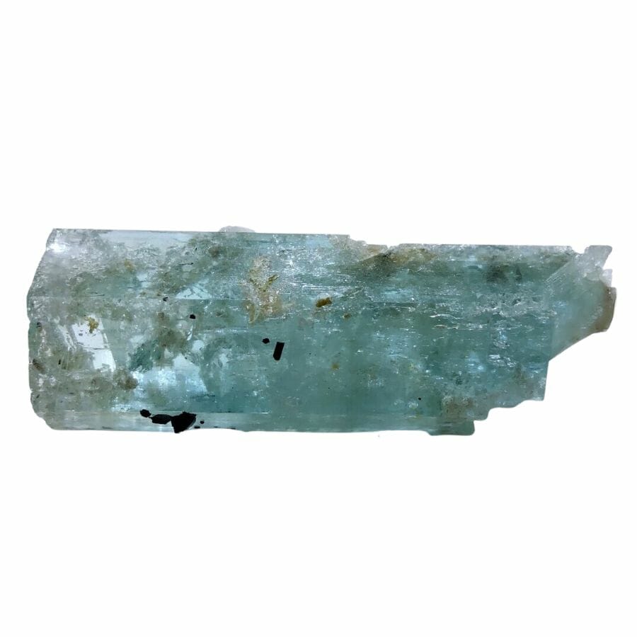 a piece of rough aquamarine crustal with black and white inclusions