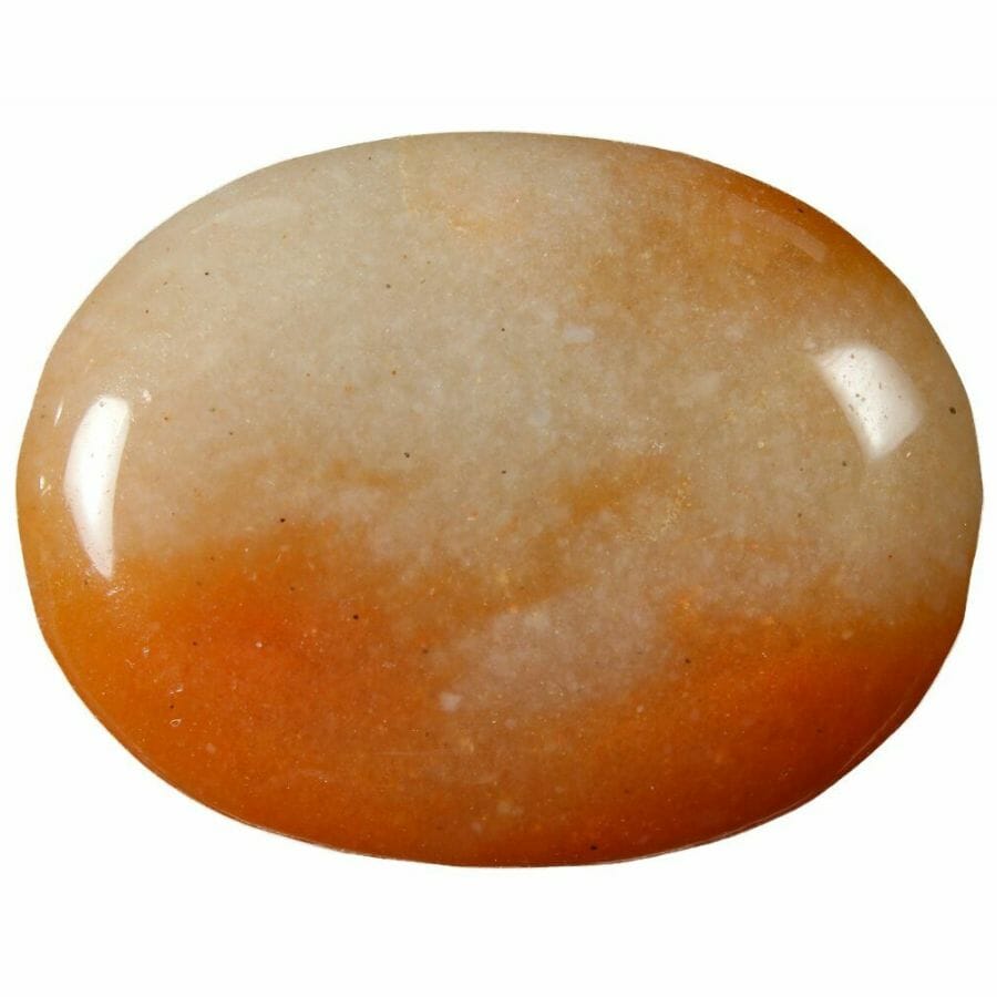 a piece of polished red and white aventurine