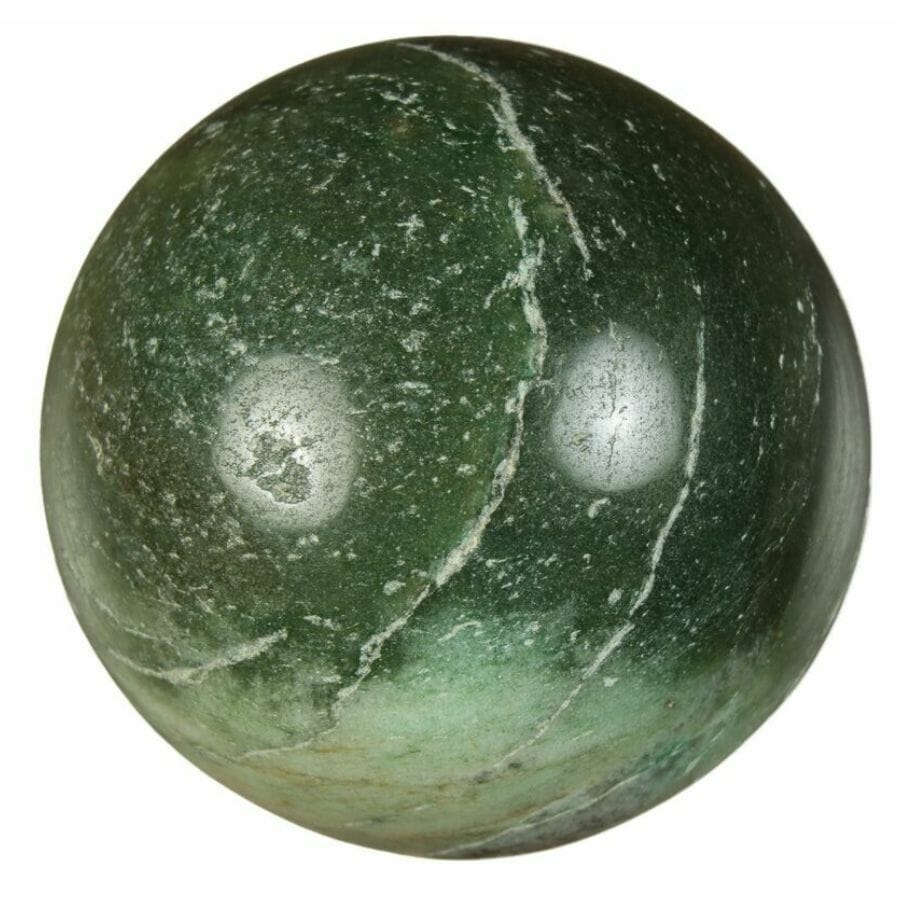 a sphere of dark green polished jade with white streaks