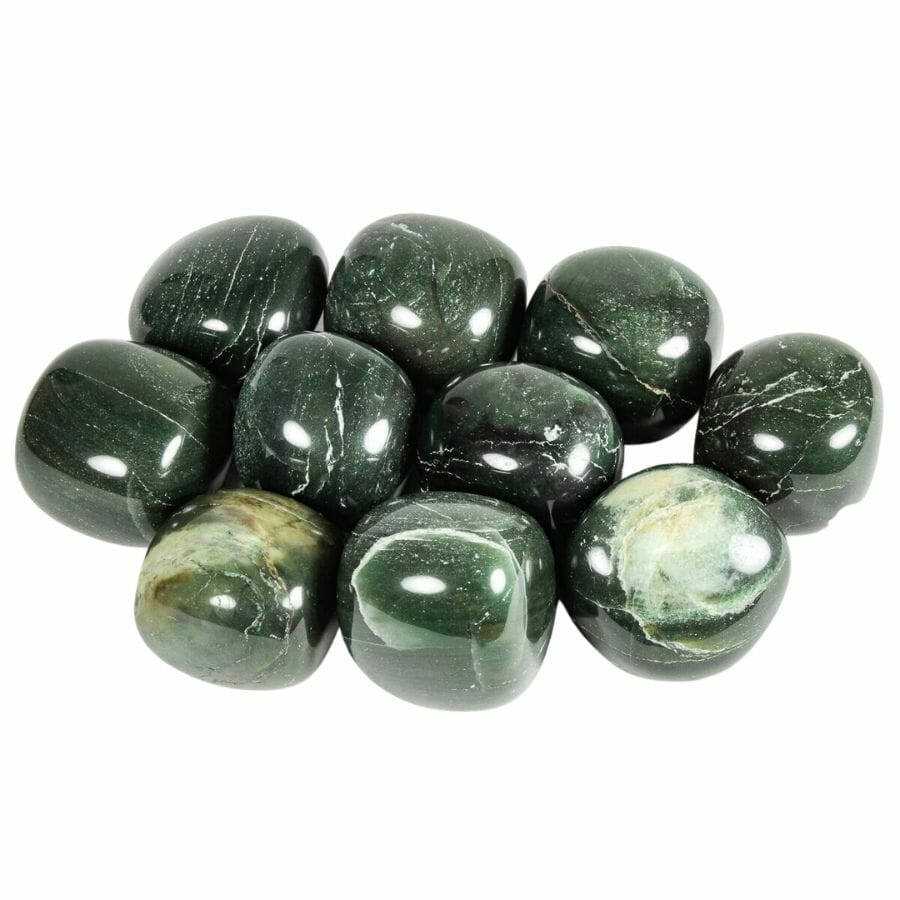 a collection of polished dark green jade stones