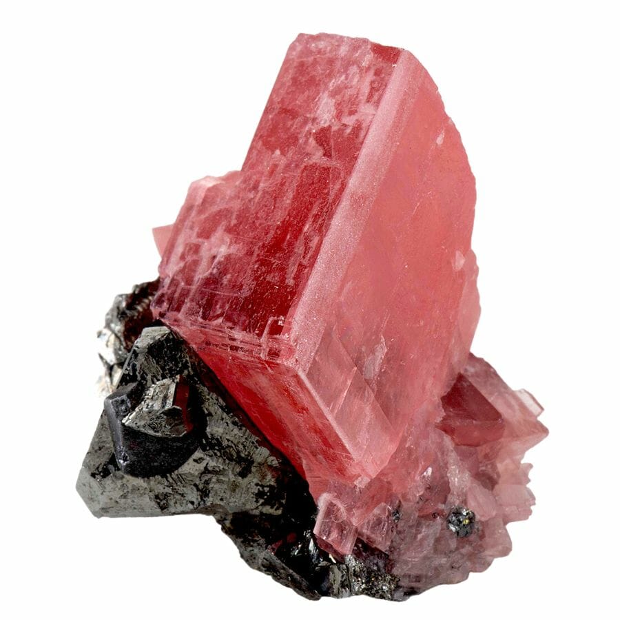 reddish rhodochrosite crystals with black tetrahedrite