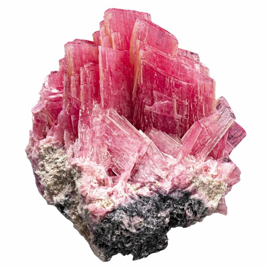 cluster of rough reddish-pink rhodonite crystals