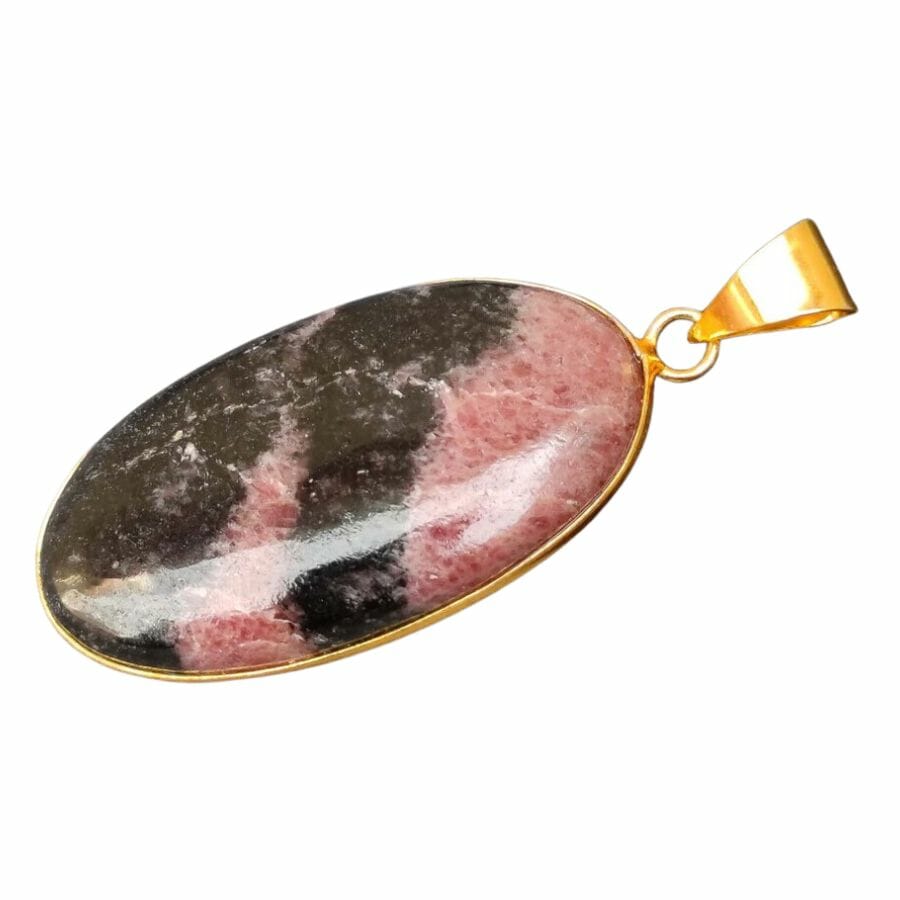 pendant made of pink rhodonite with black veins