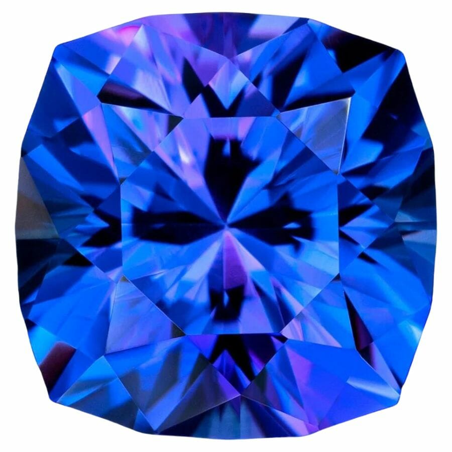 a piece of precision-cut blue and violet tanzanite