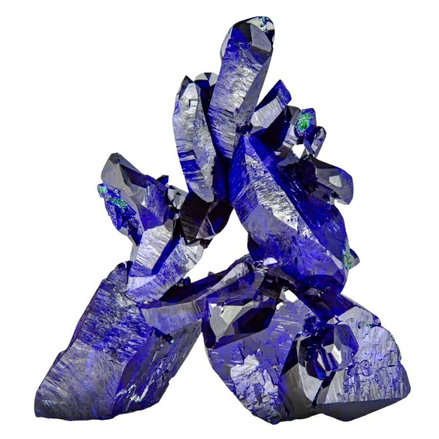 A distinct and rare A-formation of azurite crystals with streaks of silver and patches of green