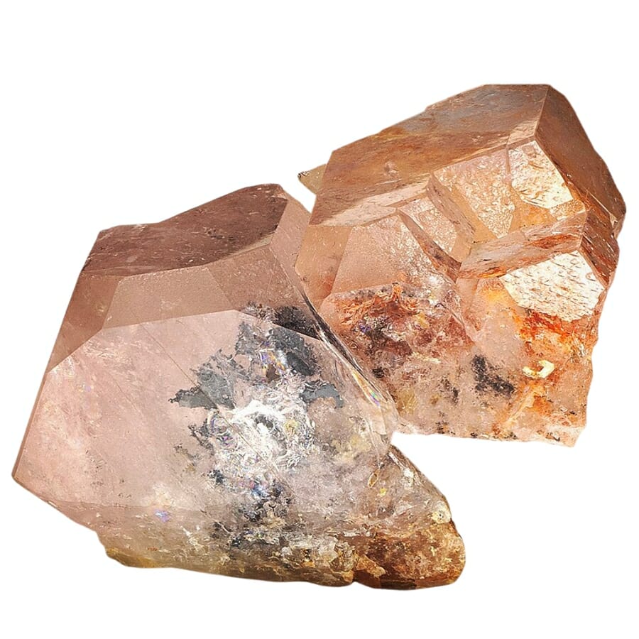 Gemmy peach-pink beryl crystals